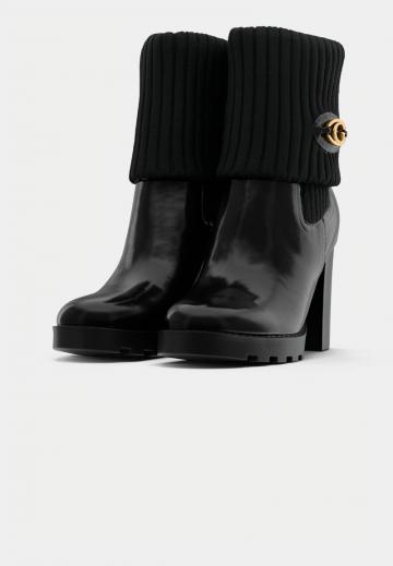 Полусапожки на высоком каблуке