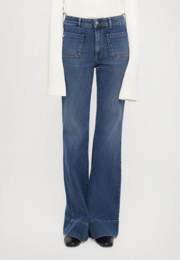 Клешеные джинсы