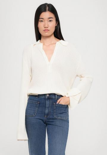 Клешеные джинсы