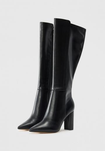 Высокие сапоги