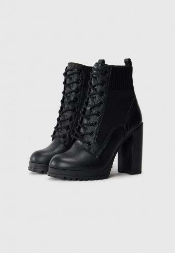 Высокие сапоги