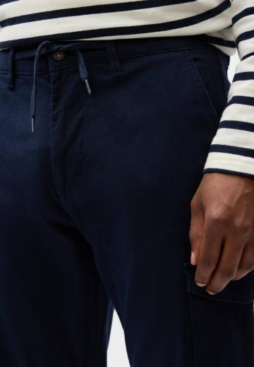 Брюки с накладными карманами