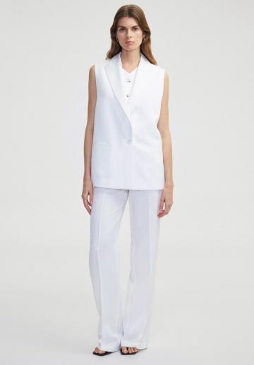 Длинный жилет