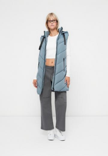 Длинный жилет