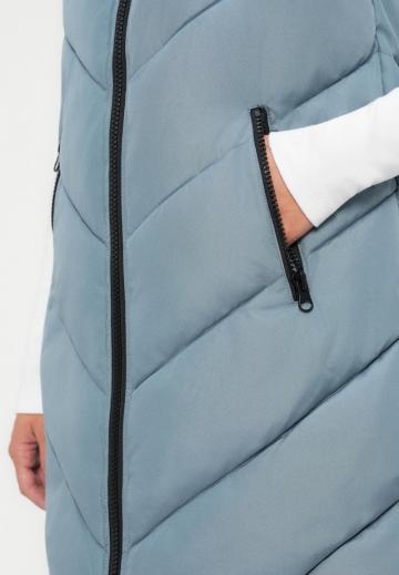 Длинный жилет