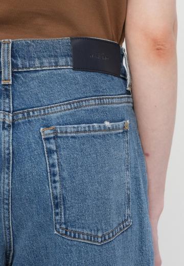 Клешеные джинсы