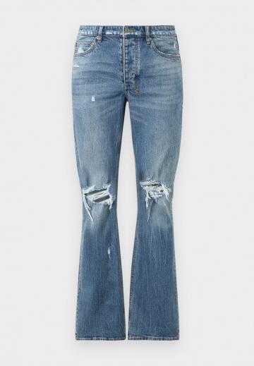 Клешеные джинсы