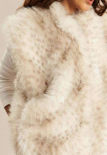 Пуховой жилет