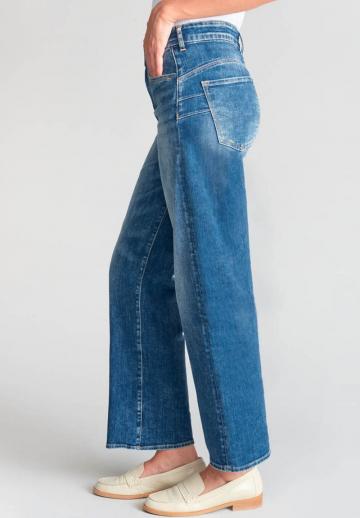 Клешеные джинсы