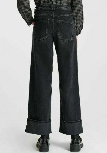 Клешеные джинсы