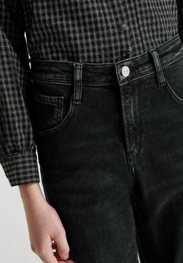 Клешеные джинсы