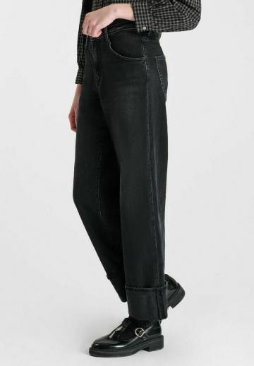 Клешеные джинсы