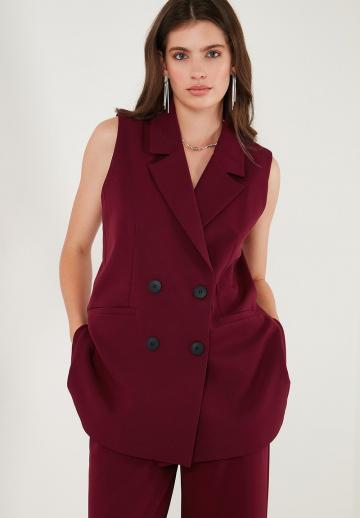 Длинный жилет