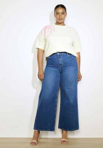 Клешеные джинсы