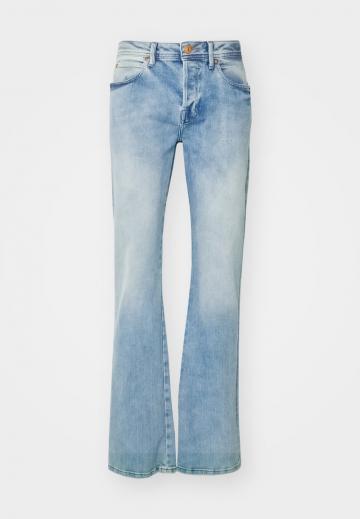 Клешеные джинсы