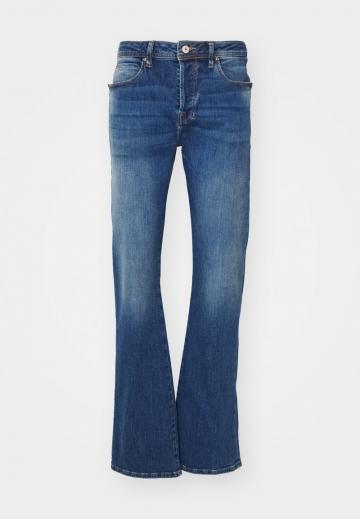 Клешеные джинсы