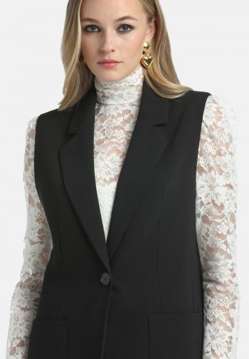 Длинный жилет