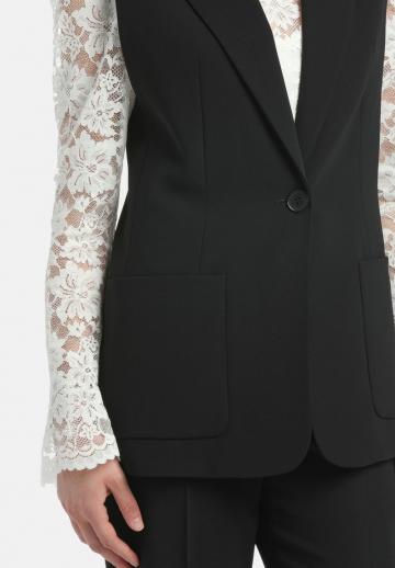 Длинный жилет