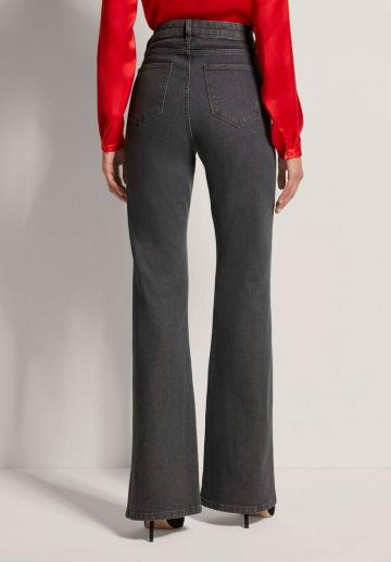 Клешеные джинсы
