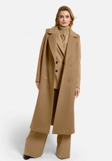 Длинный жилет