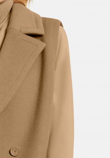 Длинный жилет