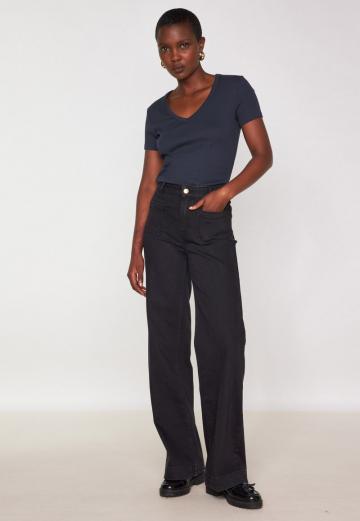 Клешеные джинсы