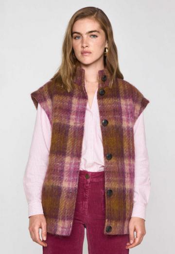 Длинный жилет