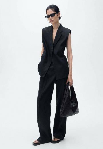 Длинный жилет