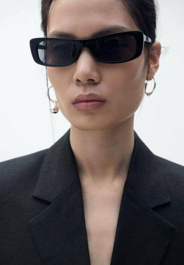 Длинный жилет