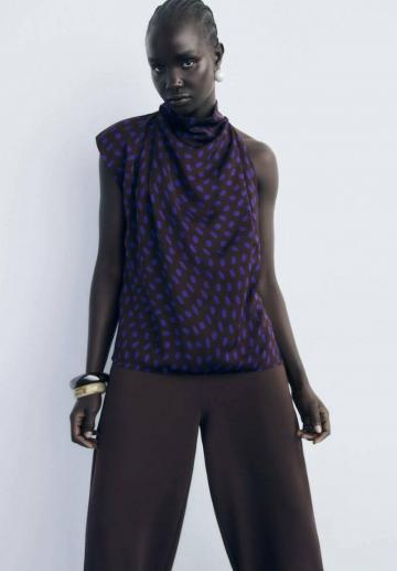 Блузка без рукавов