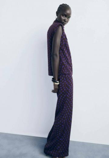 Блузка без рукавов