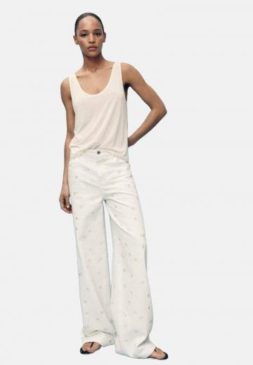 Клешеные джинсы