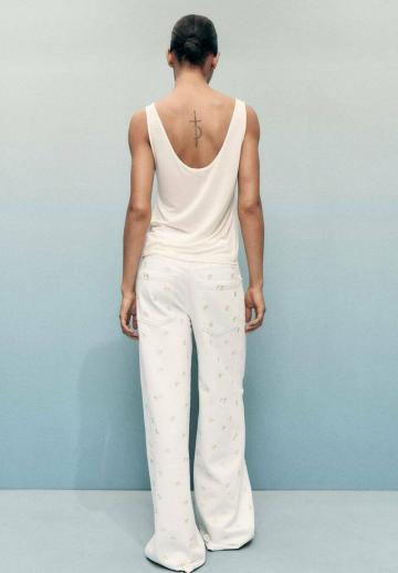 Клешеные джинсы