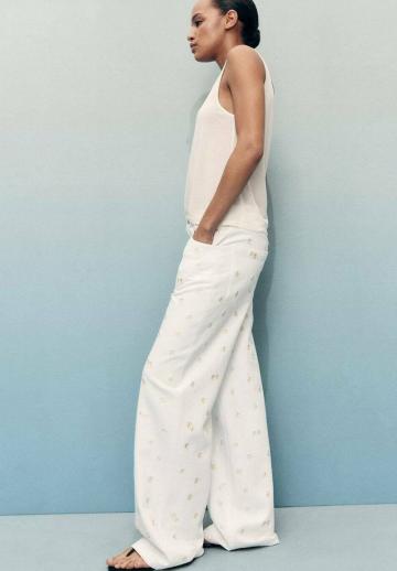 Клешеные джинсы