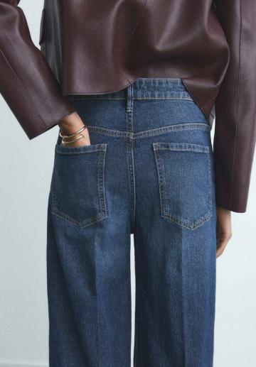 Клешеные джинсы