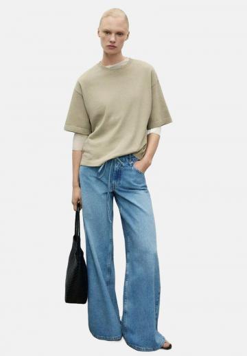 Клешеные джинсы