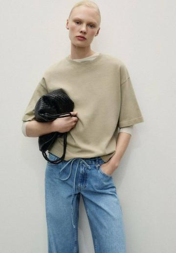 Клешеные джинсы