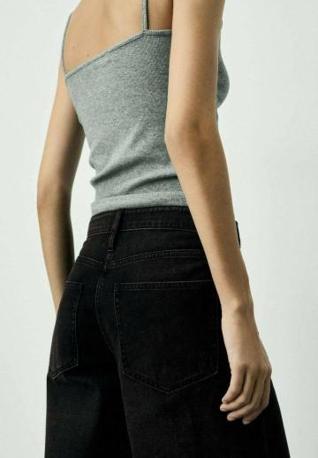 Клешеные джинсы