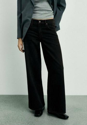 Клешеные джинсы