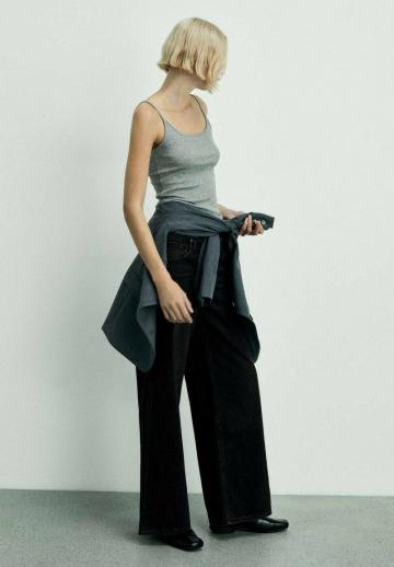 Клешеные джинсы