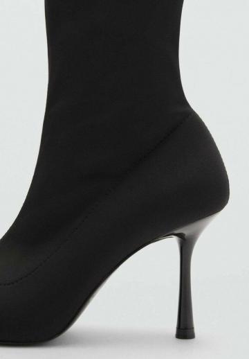 Полусапожки на высоком каблуке
