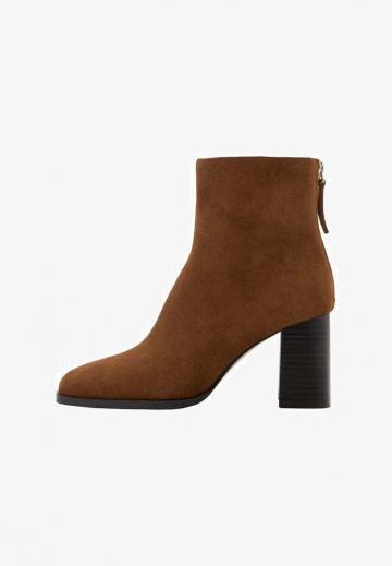 Высокие сапоги