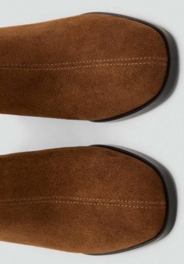 Высокие сапоги