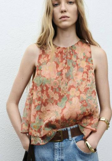 Блузка без рукавов