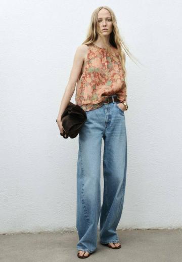 Блузка без рукавов