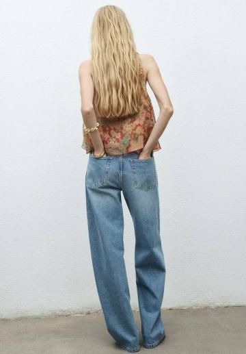 Блузка без рукавов