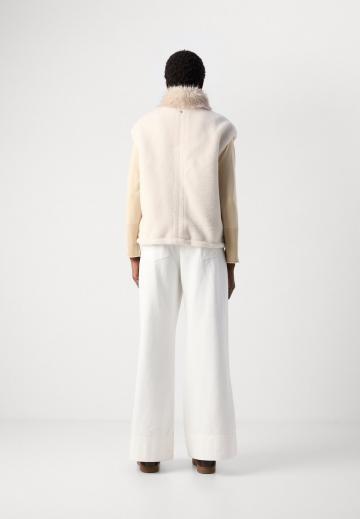 Пуховой жилет