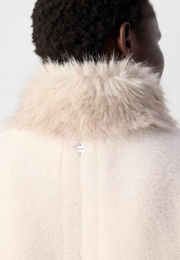 Пуховой жилет