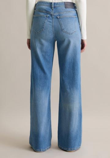 Клешеные джинсы