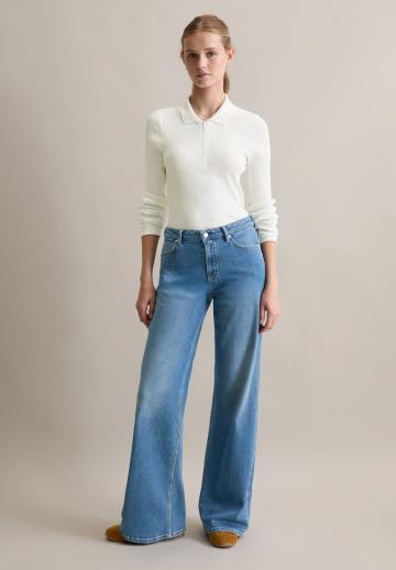 Клешеные джинсы